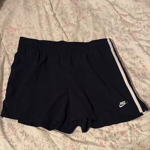 Vintage Nike Women's Navy Athletic Shorts with White Strips